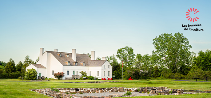 The Grande Maison of the Forges du Saint-Maurice National Historic Site in summertime.