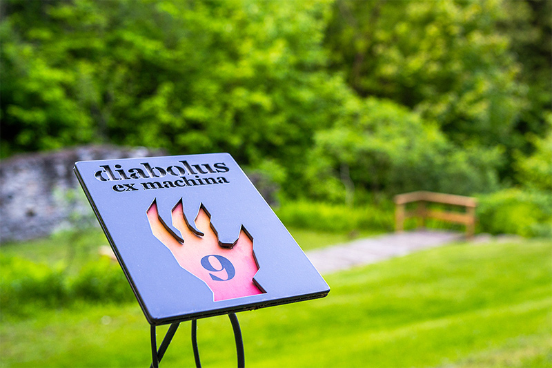 Photo of the official Diabolus ex machina audio tour sign on display outside the Forges du Saint-Maurice National Historic Site.