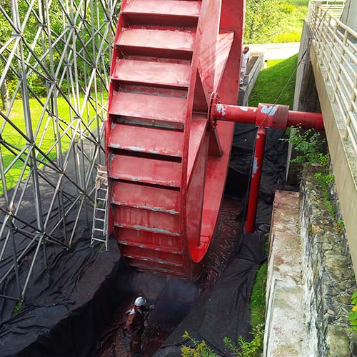 The water wheel at the blast furnace with its old painting