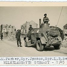 Some of Cartwright’s comrades-in-arms as they advance, in an armoured car, into Wilhelmshaven, Germany, during the final phase of the war.