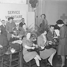 Blood collection was another important function of the Red Cross, here donors enjoy a snack in the recovery room.