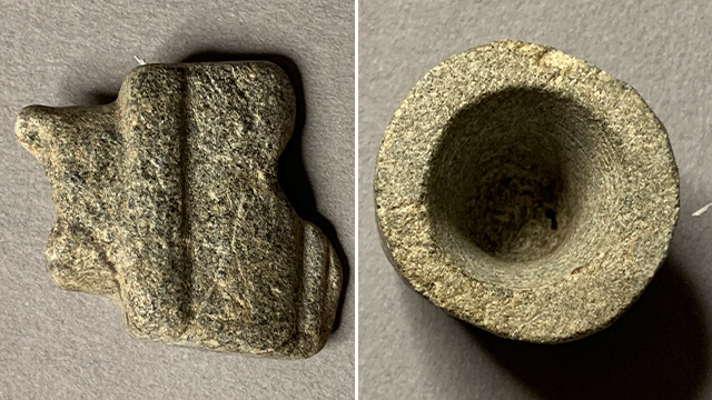Deux artefacts autochtones découverts il y a plusieurs années au lieu historique national d’Obadjiwan–Fort-Témiscamingue sont déposés sur de la pierre.