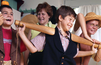 Three boys having fun during an interpretation activity.