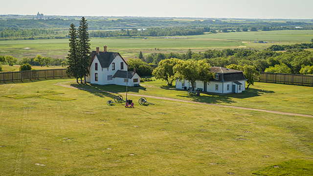 Aerial view of the Officer’s Quarters on the right and the Commanding Officer’s Residence on the left. 
