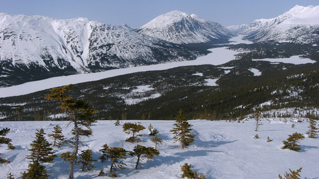 View of snowy lake and mountains 