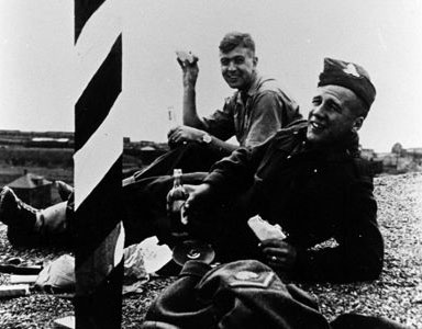 Soldiers lounging on tower roof
