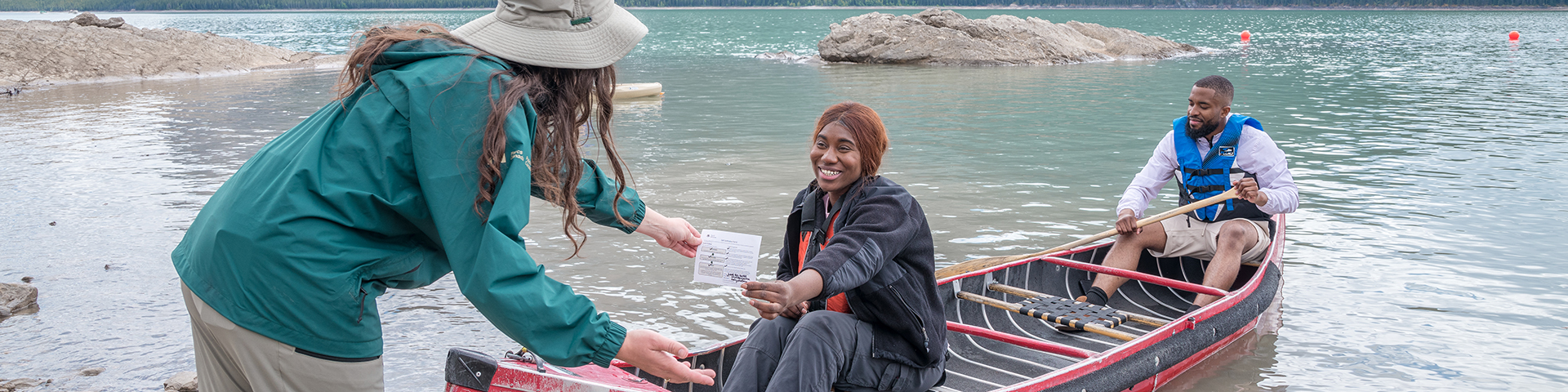 Parks Canada staff member checking water users self-certification permit 