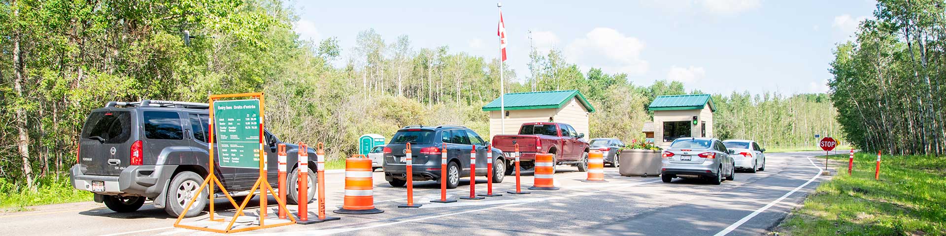 Cars line up at the Elk Island National Park South Gate Entrance kiosks.