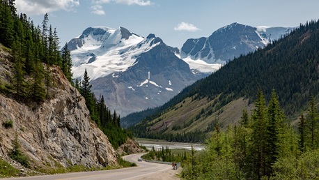 Winding road between two mountains.