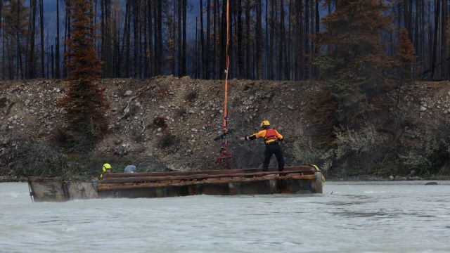 Earlier this week, Parks Canada visitor safety specialists assessed hazards and developed a plan for the Black Hawk helicopter dedicated to the incident to heli-sling the sea-can back to land. It had floated about 800 meters further down the river.