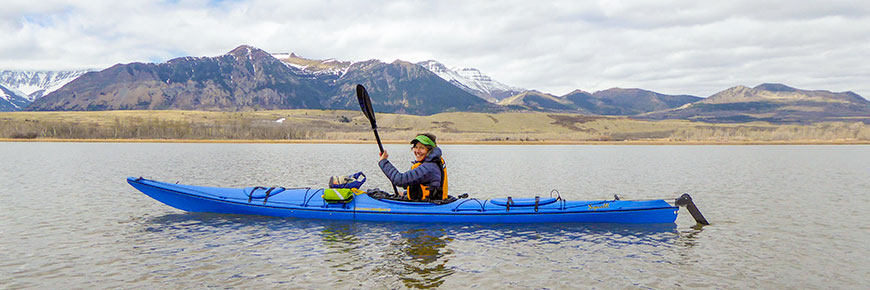 A kayaker is on the water.