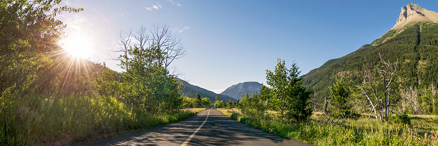 A roadside view of the scenic Red Rock Parkway