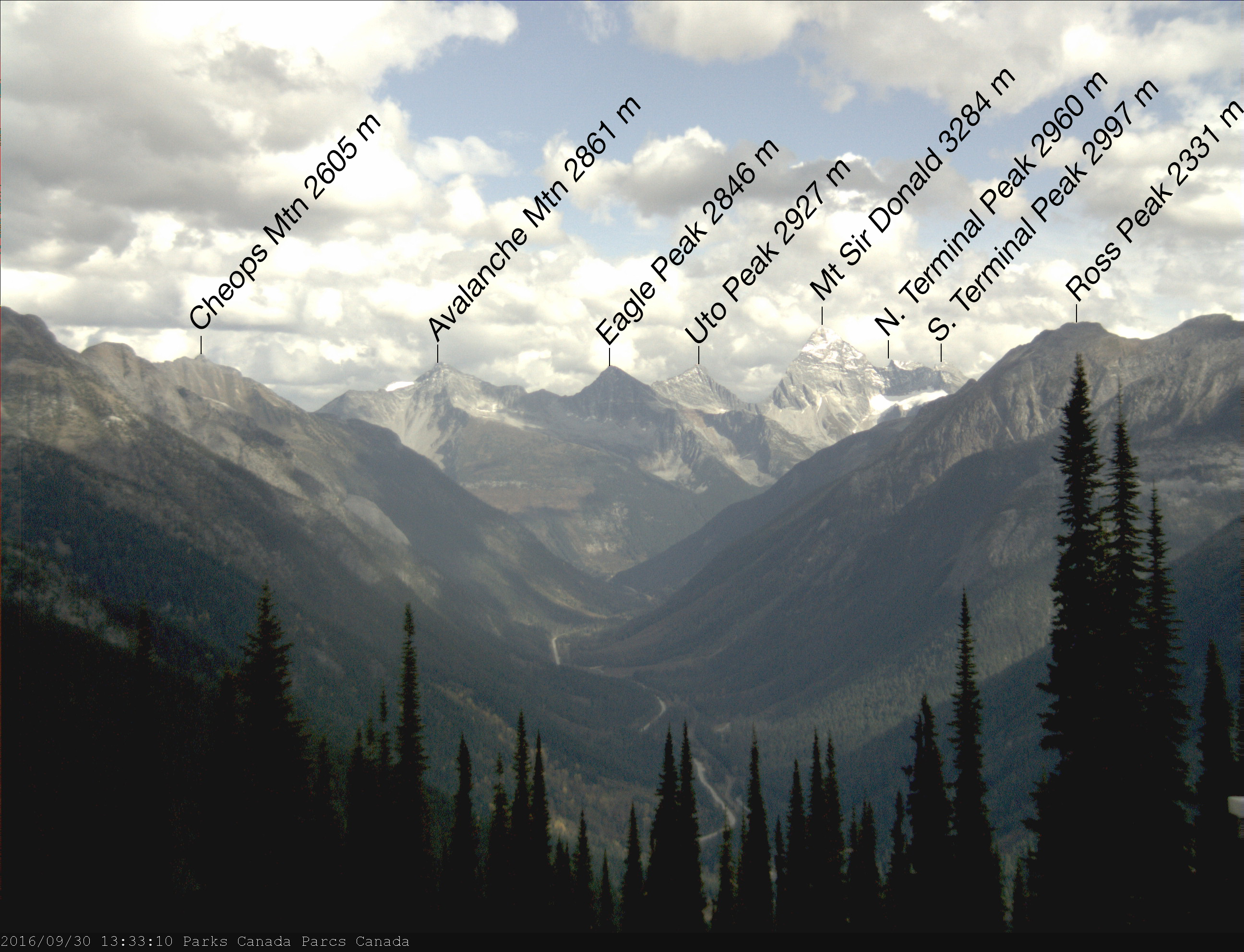 View of Sir Donald Range in Glacier National Park, Canada.  Features visible include: Mount Sir Donald, Uto Peak, Eagle Peak, Avalanche Mountain, Terminal Peaks and the Illecillewaet valley.