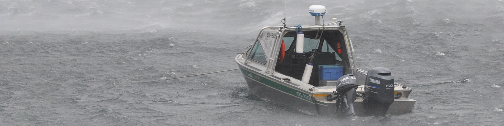 Boat in stormy waters