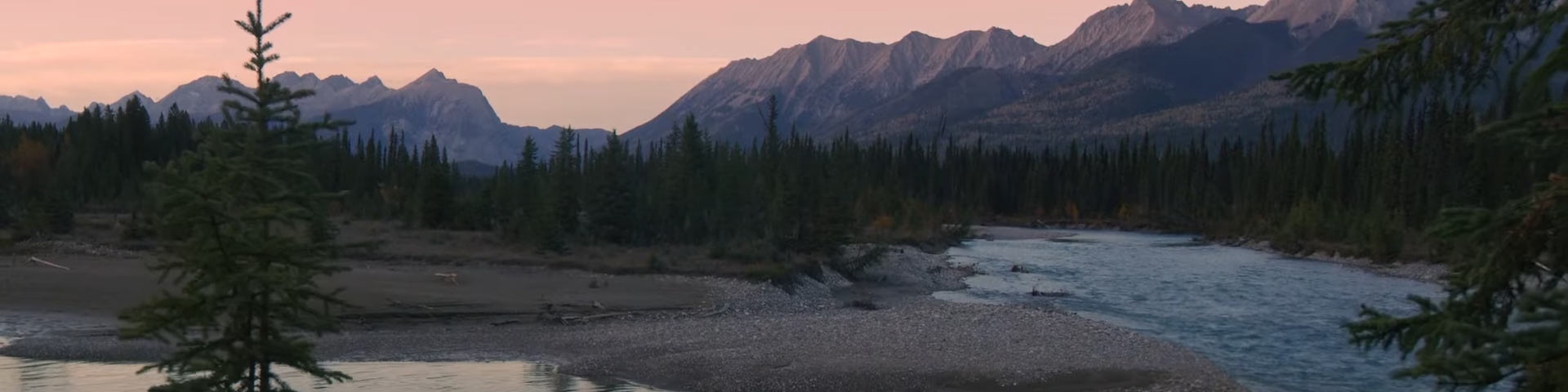 Sunset view of mountains and a river