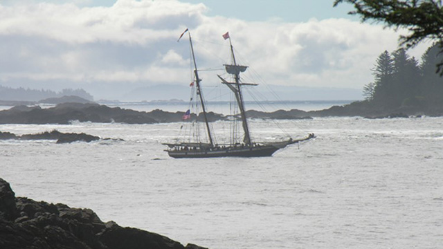 a pirate ship sailing on the water