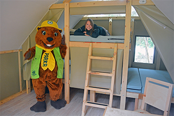 Parka, Parks Canada’s mascot, with a staff member inside the oTENTik