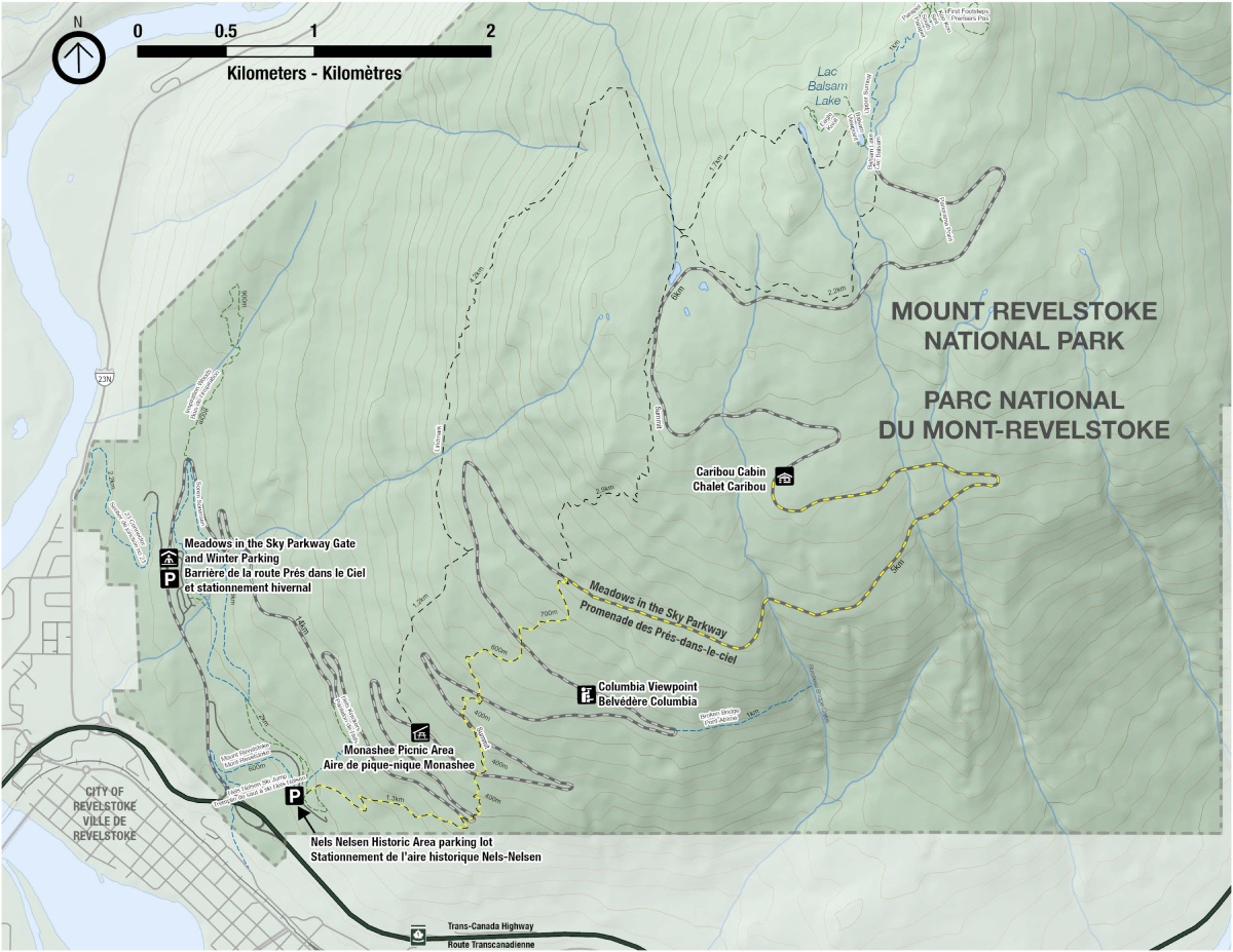 A simplified map of the park showcasing key features, including the location of the Caribou Cabin, the Meadows in the Sky Parkway, parking lots, and designated day-use areas.