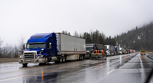 Transport Trucks stopped along a highway