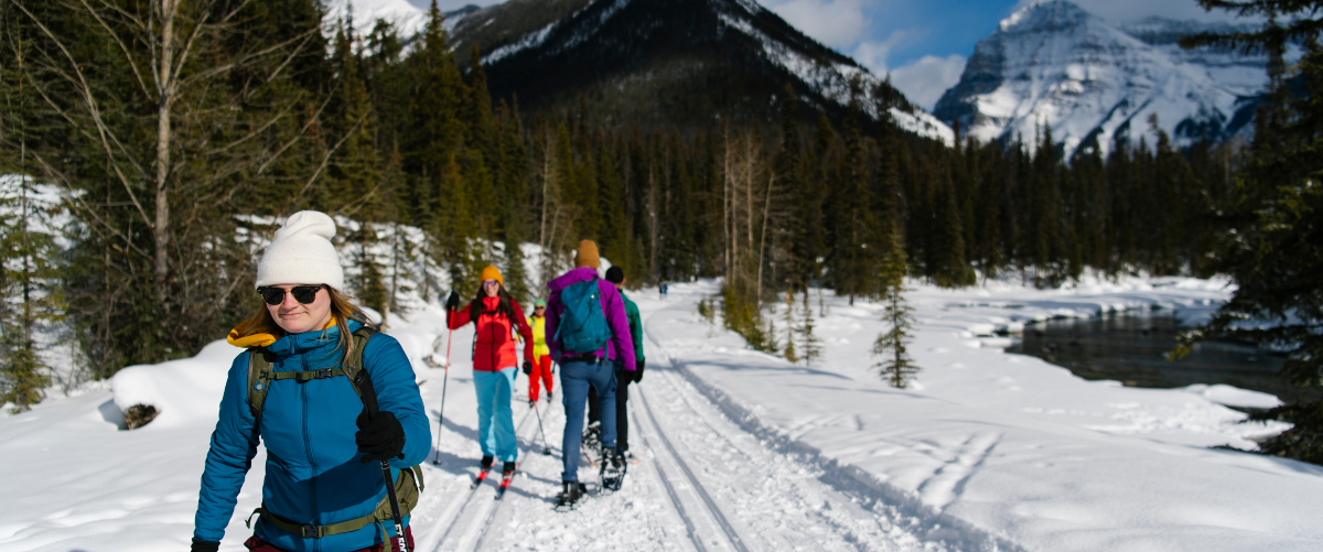 Cross-country skiers and snowshoe enthusiasts cross paths on the multi-use trail of the Kicking Horse fire access road.