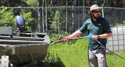 Maxime LeGal, AIS Team Lead for prevention program in Riding Mountain National Park.