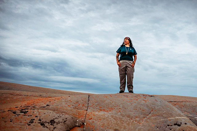 A Parks Canada employee in uniform.
