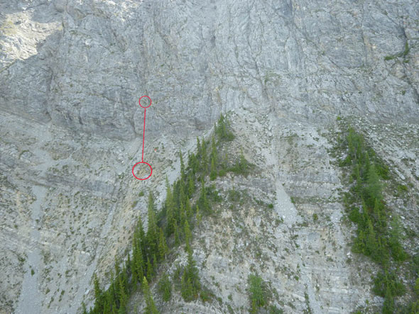 The subject fell from the upper red circle and can be seen inside the lower red circle below.