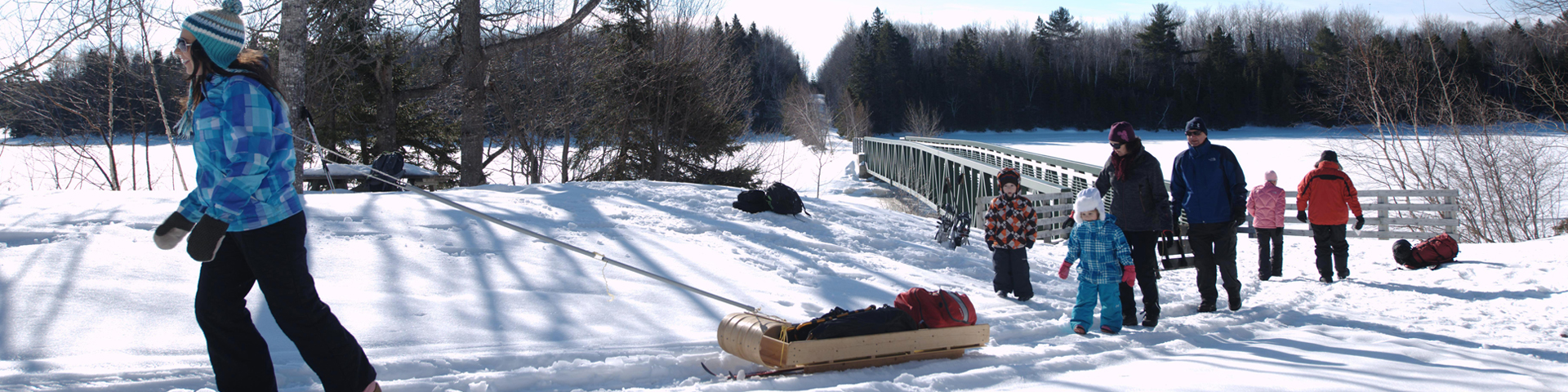 Cyclists on the snow near the Visitor Reception Centre.