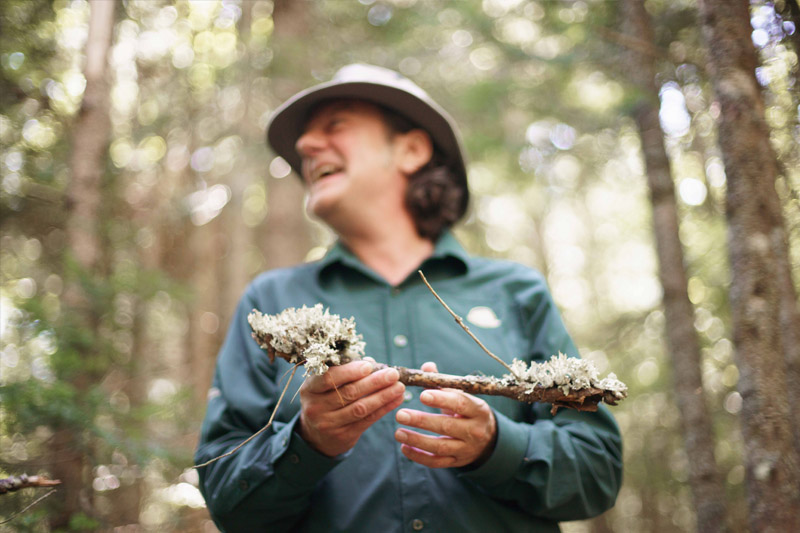 A Parks Canada Heritage Interpreter in the forest