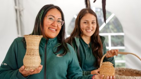 Interpreters holding basket