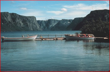 Small open boats on Western Brook Pond in the 1970's