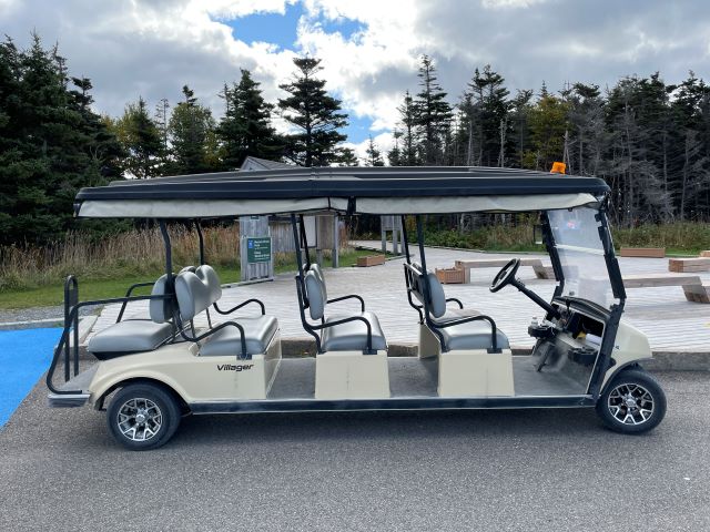 A large golf cart for 8 people. 