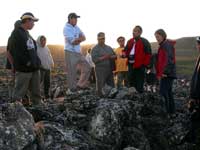Inuit youth around an ancient       0;A;	grave