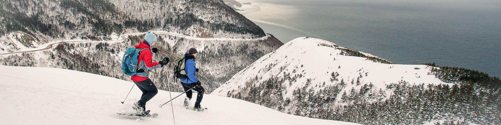 Two people snowshoeing in Cape Breton Highlands National Park