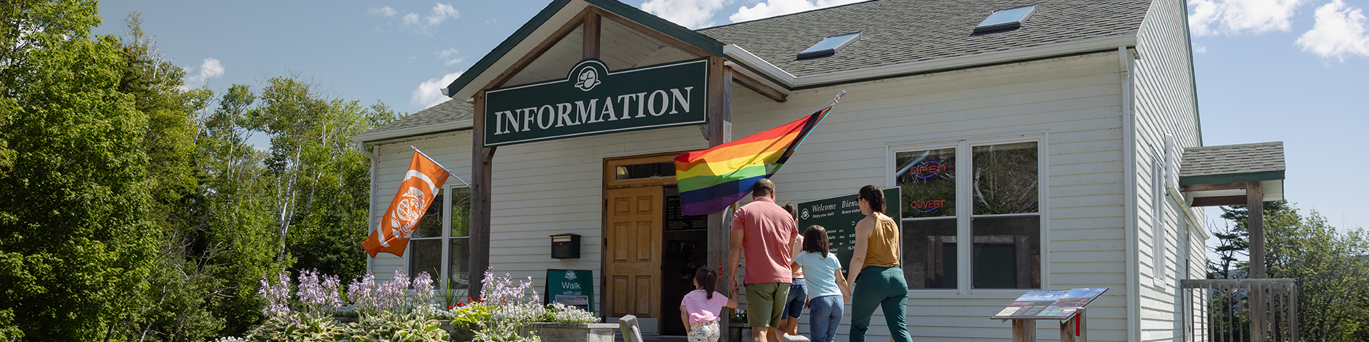 A family walking into the visitor centre.