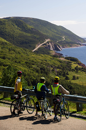 Cycling along the Cabot Trail near Le Buttereau