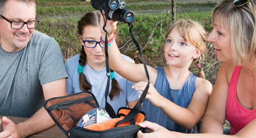 A family with our self-discovery dark-sky kit