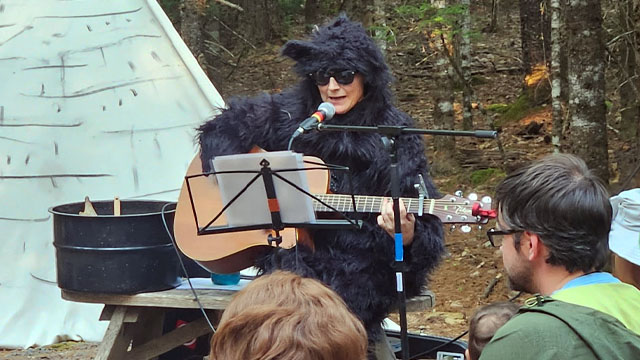 A person wearing a fluffy costume.