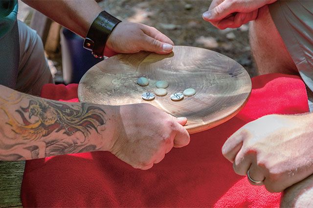 Two people playing waltes.