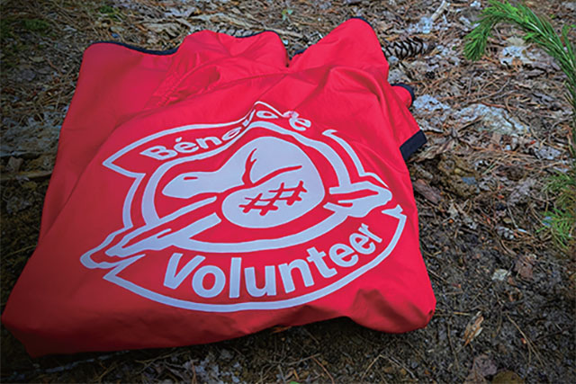 A red volunteer jacket.