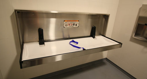 The adult change table in the family accessible washroom.