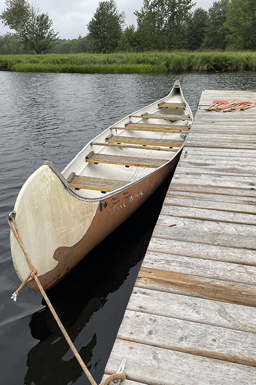 Big Canoe next to the dock.