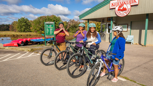 A family on bicycles at Whynot Adventure, The Keji Outfitters.