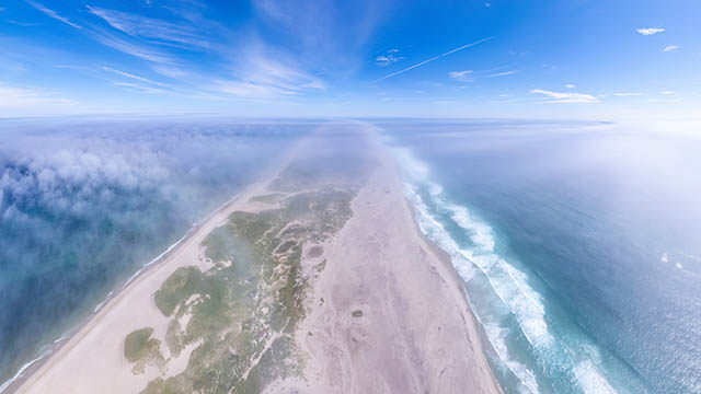 Aerial view of Sable Island through a light layer of fog.