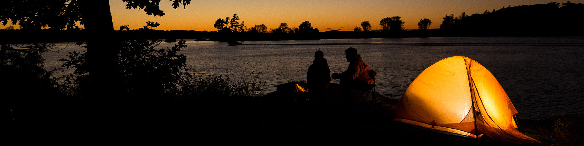 A tent along the shoreline.