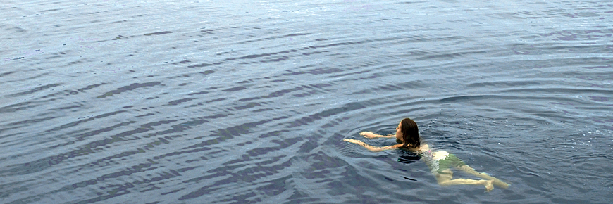 A women swimming in the water