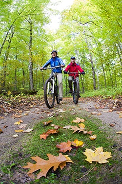 Visitors bike on Beausoleil Island