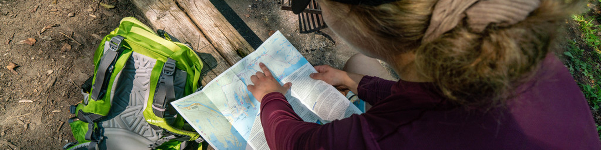 A woman looking at a map.