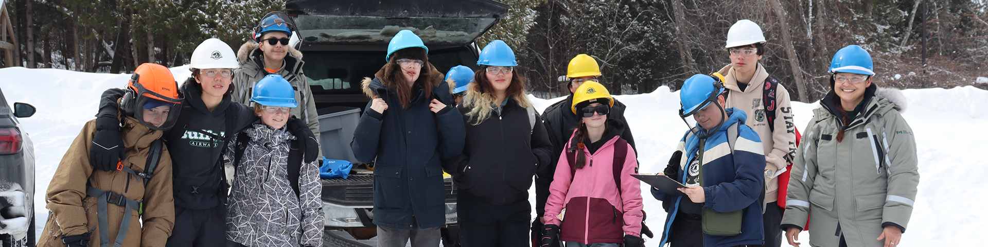 Parks Canada staff and Grade 7/8 students from White Pines Collegiate & Vocational School preparing to survey black ash trees at Fort St. Joseph National Historic Site