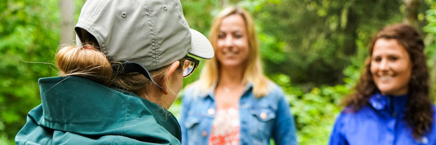 A Parks Canada employee and two volunteers